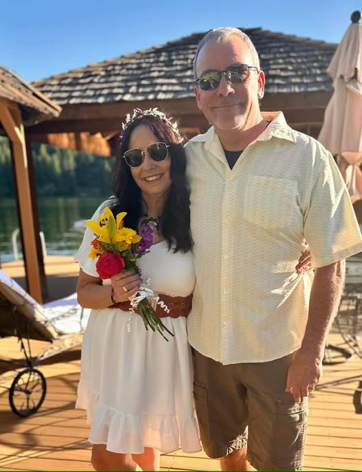 Terry and Donna standing on a dock by a lake in eastern Washington