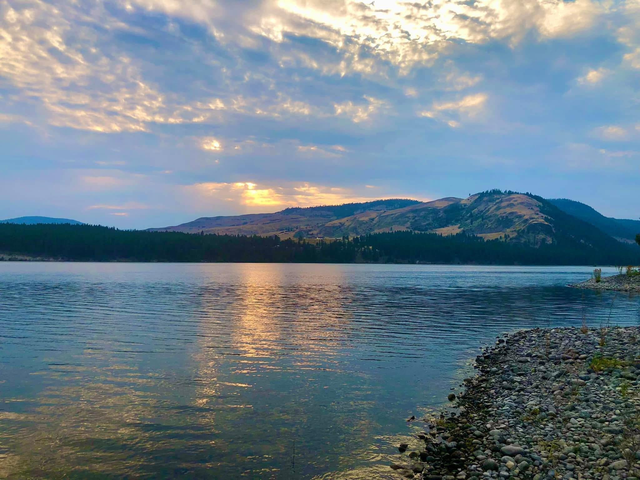 unset over Lake Roosevelt in Washington after moving to save money for retirement